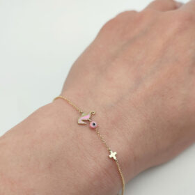 Children's bracelet for girls with a hippocampus, a cross and a pink evil eye K9 gold – BRAX127