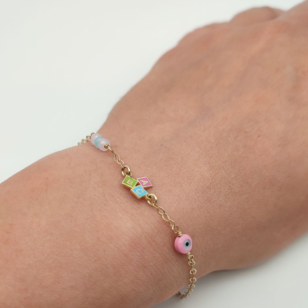 Βραχιόλι παιδικό για κορίτσι με το Α,Β,Γ, χάντρες και ματάκι χρυσό Κ9 – BRAX146